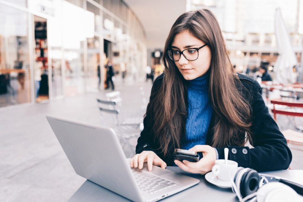 Person viewing reports on a laptop